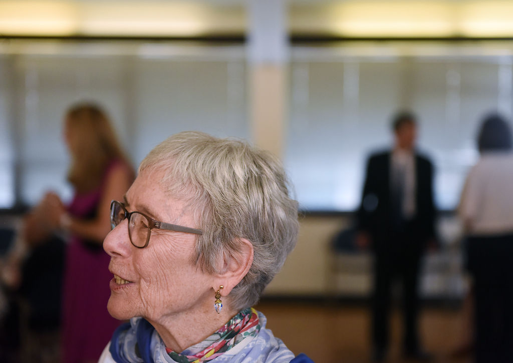 Axie Hindman, the wife of former mayor Darwin Hindman, greets attendees